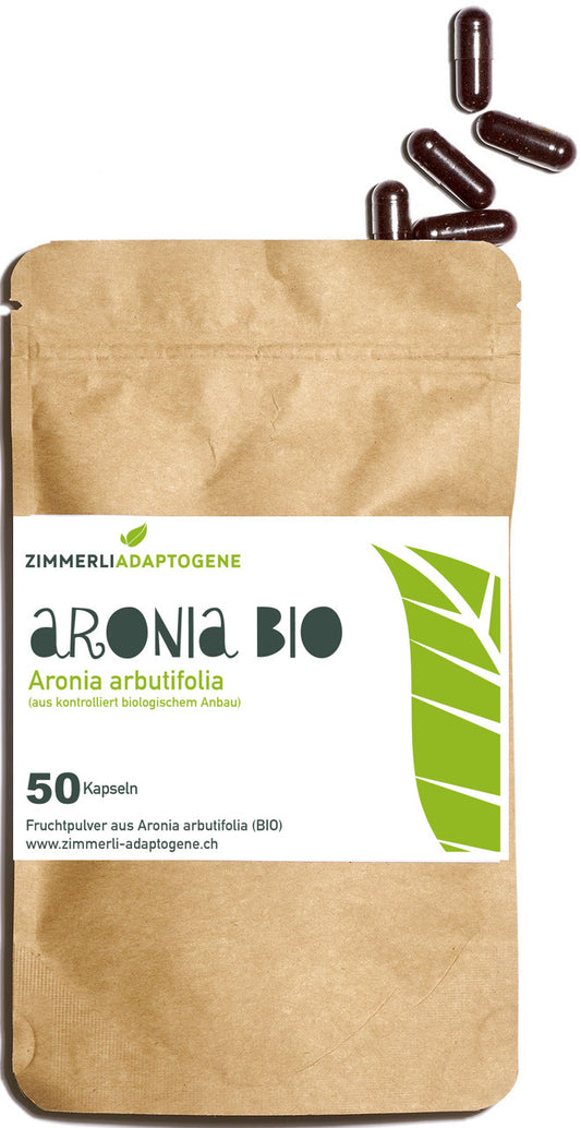 Zimmerli Adaptogene Aronia BIO, 50 Kapseln: brauner Beutel mit dunkelroten Kapseln darüber.