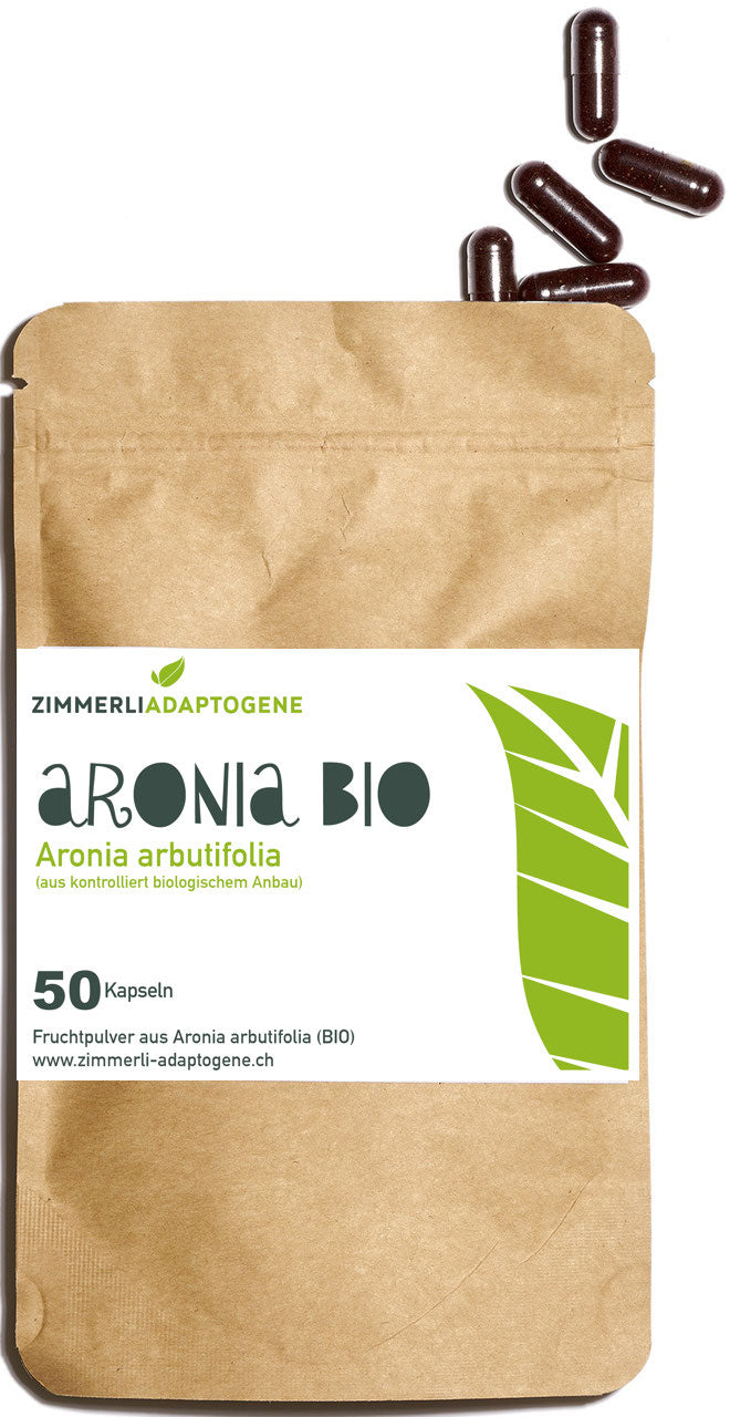 Zimmerli Adaptogene aronia BIO, 50 capsule: sacchetto marrone con capsule rosso scuro sopra.